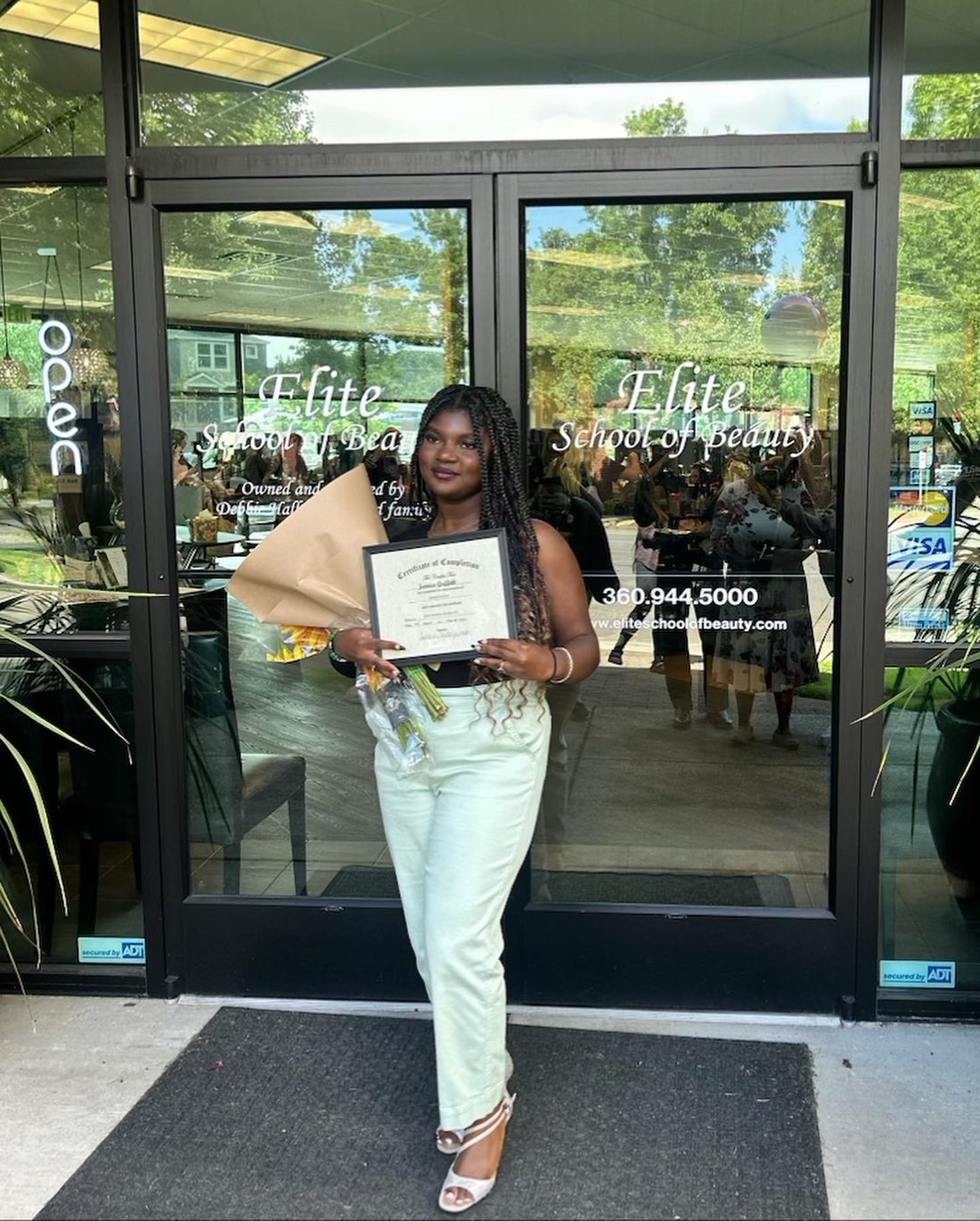 The stylist behind Crowned by Aria, a licensed cosmetologist
